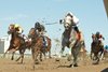 Thoroughbred&#39;s return to action on opening day of the 2021 thoroughbred race meet.#7Pesaro under jockey Christopher Husbands, turns into the stretch beside (middle Ri N Ginger, jockey Larry Munoz, and outside Redhair N Freckles jockey Keveh Nicholls, during the 6th race. Woodbine/ Michael Burns Photo