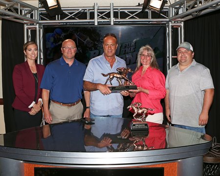 Connections of Piedi Bianchi receive the Indiana Horse of the Year award at Indiana Grand