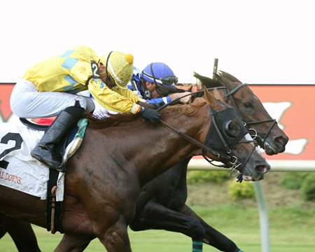 Eons (outside) wins the Buckland Stakes at Colonial Downs