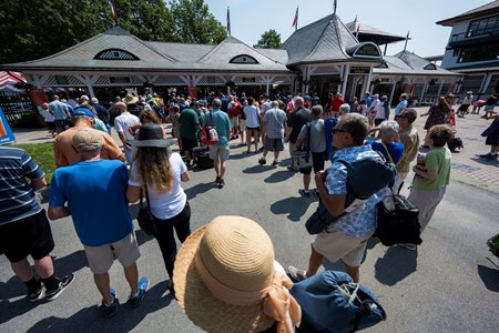 Fans crowd the entrance at Saratoga Race Course