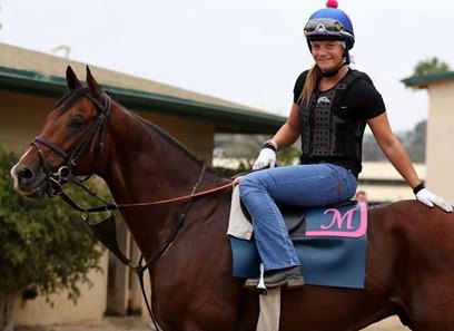 Anna Meah aboard one of her stable's horses