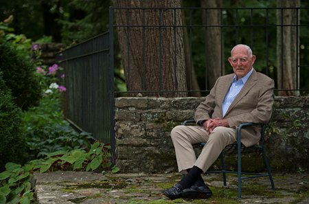 Ted Bassett in his garden at Lanark Farm near Versailles, Ky.