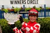 Jockey Justin Stein guides Munnyfor Ro to victory in the $500,000 dollar Woodbine Oaks. Munnyfor Ro is owned by Raroma Stables Inc (L) and trained by Kevin Attard (R).Woodbine/ Michael Burns Photo