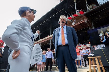 Steve Asmussen basks in the glory of his record in the winner's circle at Saratoga Race Course