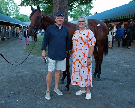 Larry Best and Dede McGehee with the Bolt d'Oro colt consigned as Hip 132 at The Saratoga Sale