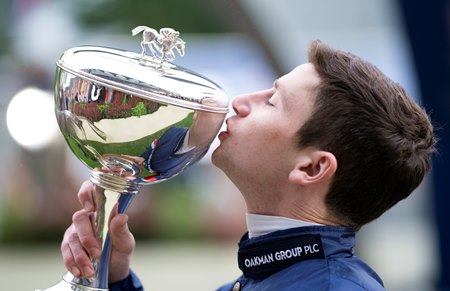 Oisin Murphy with the 2021 British champion jockey trophy