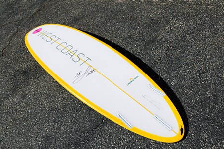 This West Coast branded surfboard signed by Hall of Fame jockey Mike Smith was among 20 customized surfboards branded with the names of Lane's End stallions and auctioned to raise money for the Permanently Disabled Jockeys Fund