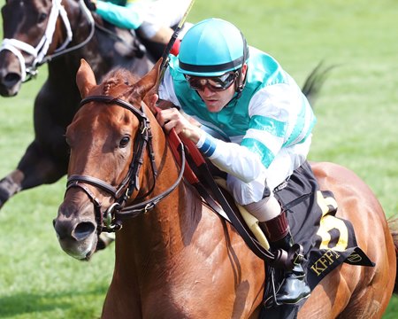 Monition wins an allowance race at Keeneland