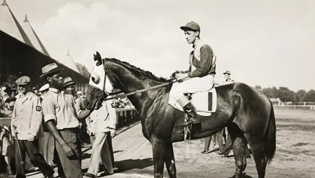 Thanksgiving and jockey Eddie Arcaro after winning the 1938 Travers Stakes at Saratoga Race Course