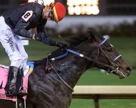 Jockey Corey Lanerie celebrates a victory from Smile Happy in the Kentucky Jockey Club at Churchill Downs