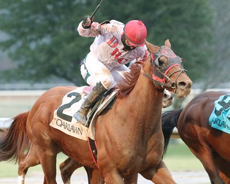 Rated R Superstar gets up in the closing strides to win the Fifth Season Stakes at Oaklawn Park