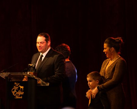 (L-R): Brad Cox, wife Livia Frazar, and son Brodie Cox at the Eclipse Awards