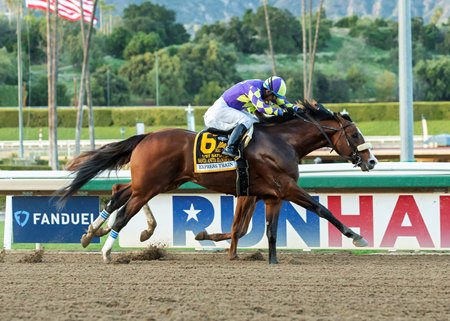 Express Train defeats Warrant by a head in the Santa Anita Handicap at Santa Anita Park
