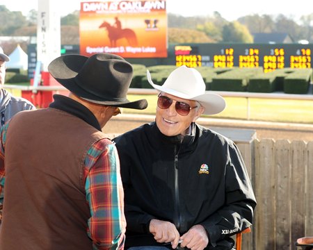 D. Wayne Lukas chats with a fan at Oaklawn Park