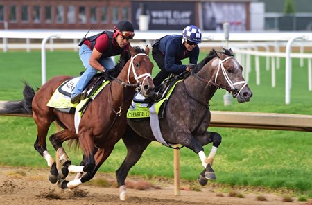 Pioneer Of Medina breezes outside Charge It in a pre-Kentucky Derby drill April 30 at Churchill Downs