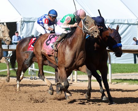 Fulsome wins the 2022 Oaklawn Mile Stakes at Oaklawn Park