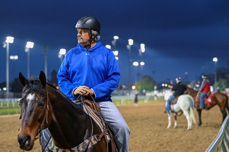 Trainer Steve Asmussen on his pony at Churchill Downs