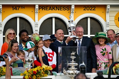 Owner Seth Klarman of Klaravich Stables (r) celebrates with trainer Chad Brown following the Preakness Stakes at Pimlico Race Course