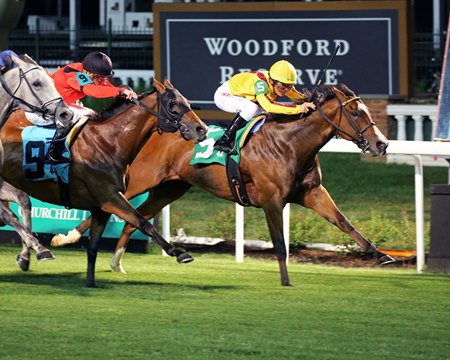 Twilight Gleaming (yellow cap) prevails in the Mamzelle Overnight Stakes at Churchill Downs
