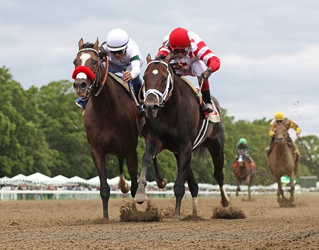 Mind Control (right) outduels Hot Rod Charlie to win the Salvator Mile Stakes at Monmouth Park