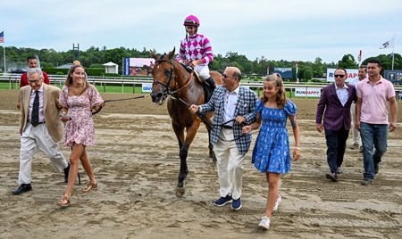 Rockemperor with jockey Flavien Prat is lead to the winner’s circle by his connections after winning the 64th running of The Bowling Green at the Saratoga Race Course Sunday July 31, 2022 in Saratoga Springs N.Y. Photo Special to the Times Union by Skip Dickstein