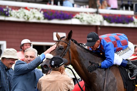 Robin Sparkles in the winner's circle after the Caress Stakes at Saratoga Race Course