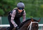Life Is Good with exercise rider Amelia Green gallops back to the barn after his final speed work before next Saturday’s Whitney Stakes at the Saratoga Race Course Saturday July 30, 2022 in Saratoga Springs N.Y. 