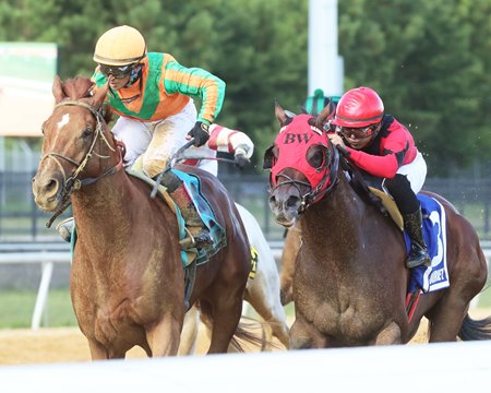 Jalen Journey, right, wins the Chesapeake Stakes on a DQ