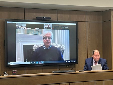 Clay Patrick (right) looks on as Bob Baffert testifies via video conference during the Kentucky Horse Racing Commission appeal hearing