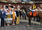 Jockey Irad Ortiz Jr. sits atop Phantom Smoke after winning the second race on card at the Saratoga Race Course Sunday Aug. 21, 2022 in Saratoga Springs N.Y. This win by Phantom Smoke was the 1,000th win for West Point Thoroughbreds, the partnership group based in Saratoga Springs.