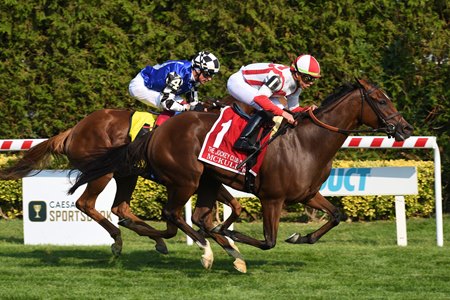 McKulick inches away from Toskana Belle to win the  Jockey Club Oaks Invitational Stakes at Aqueduct Racetrack