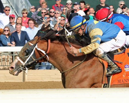 Manny Wah winning the 2022 Phoenix Stakes at Keeneland