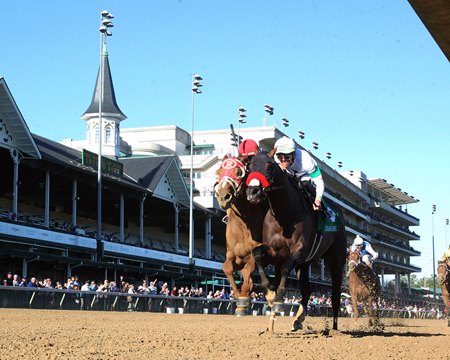 Hot Rod Charlie (inside) edges Rich Strike in the Lukas Classic Stakes at Churchill Downs