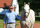 Tapit being shown with Brian Graves. 
Brian Graves at Gainesway Farm near Lexington, Ky., on June 22, 2022. 


