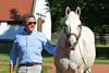 Tapit being shown with Brian Graves. 
Brian Graves at Gainesway Farm near Lexington, Ky., on June 22, 2022. 


