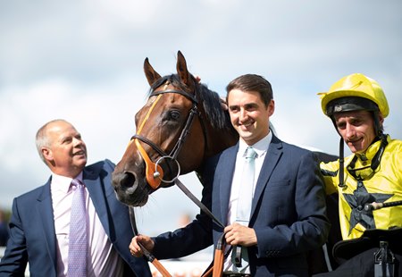 Caturra with his connections after a victory in the 2021 Flying Childers Stakes at Doncaster Racecourse 