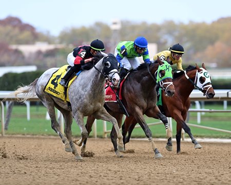 Champions Dream (outside) rallies to victory in the 2022 Nashua Stakes at Aqueduct Racetrack