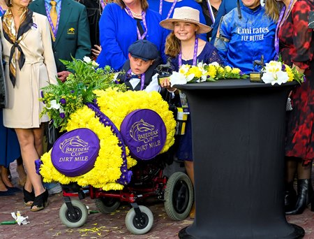 Cody Dorman in the winner's circle after Cody's Wish's victory in the 2022 Breeders' Cup Dirt Mile at Keeneland