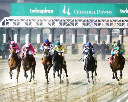 The field breaks from the gate in the off-the-grass Commonwealth Turf Stakes at Churchill Downs