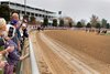 Fans watch horses round the fourth turn in front of their chalet during the Breeders’ Cup Dirt Mile the Breeders’ Cup World Championships at Keeneland Race Course in Lexington, KY on Saturday, November 5, 2022.