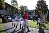 Jockeys walk through the paddock to find their mounts before the third race of the day during the 2022 Breeders’ Cup World Championships at Keeneland in Lexington, Ky., Saturday, November 5, 2022. 