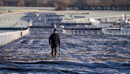 Clerk of course Jon Pullin surveys the frost-covered course at Cheltenham 