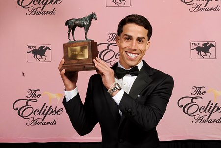 Irad Ortiz Jr. with his champion jockey trophy at the 2022 Eclipse Awards 