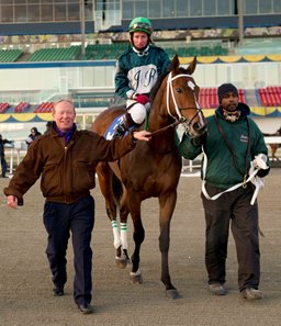 Ricky Dookeran (right) leads Lexie Lou at Woodbine