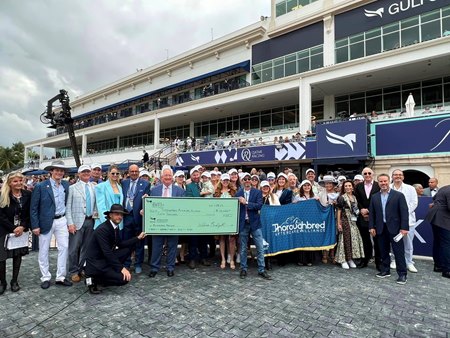 TAA representatives accept donation from 1/ST following the Pegasus World Cup Filly & Mare Turf at Gulfstream Park