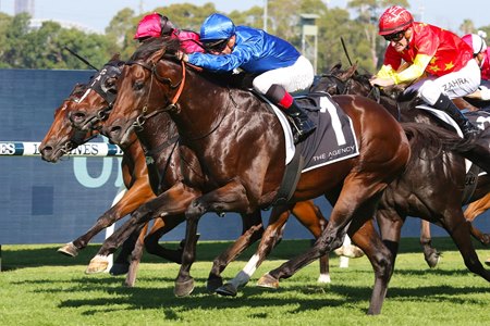 Anamoe (blue cap) prevails in the George Ryder Stakes at Rosehill Gardens