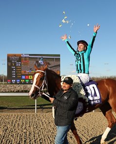 Jockey Jareth Loveberry celebrates after Two Phil's wins the Jeff Ruby Steaks at Turfway Park