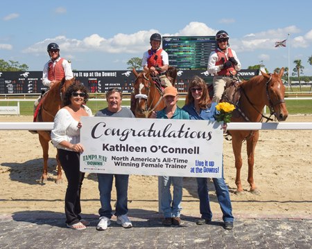 Kathleen O'Connell (far right) becomes the all time winningest female trainer in North America