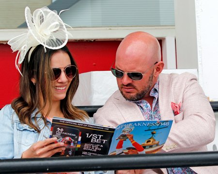 Fans handicap the Preakness Stakes day card at Pimlico Race Course
