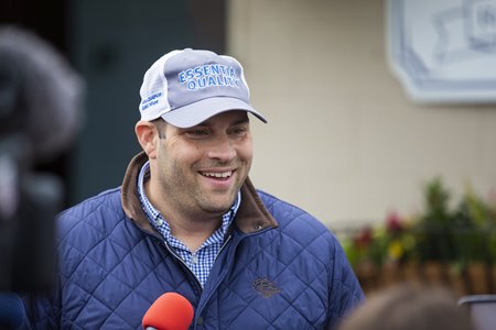Trainer Brad Cox speaks with reporters outside his Churchill Downs barn